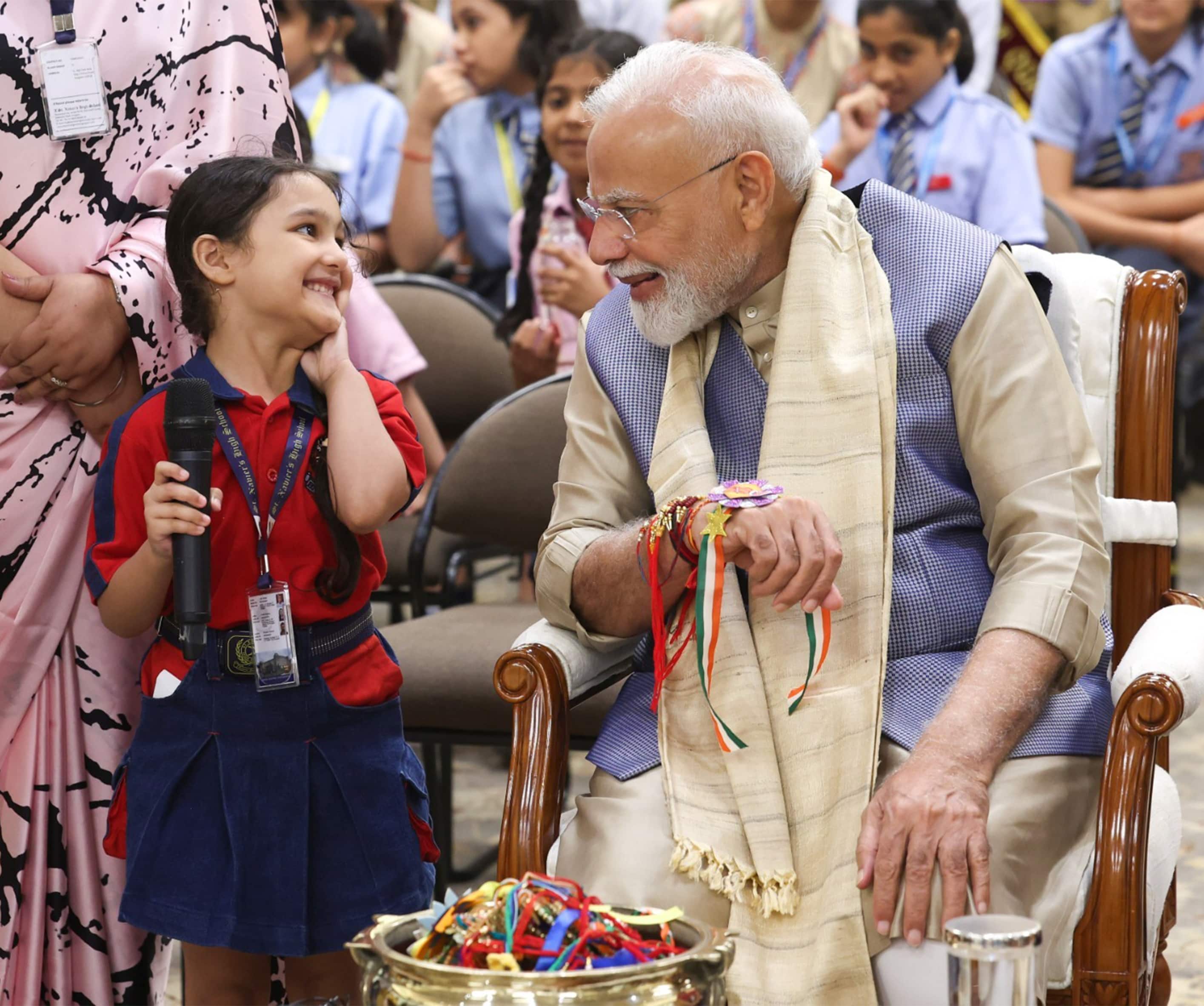 Prime Minister shares glimpses of Raksha Bandhan celebrations at 7, Lok Kalyan Marg