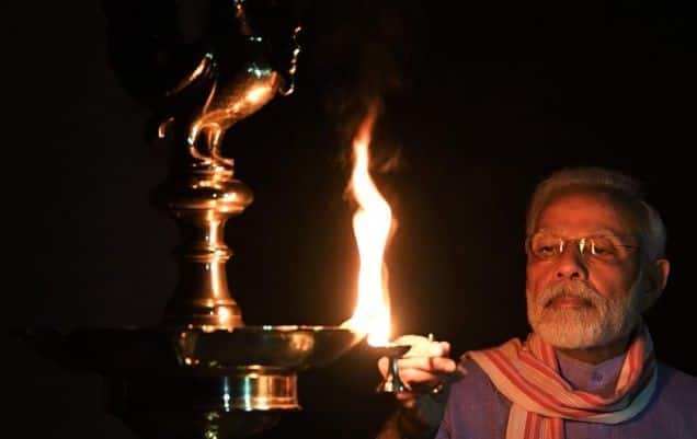 PM Modi lights up lamp at his residence