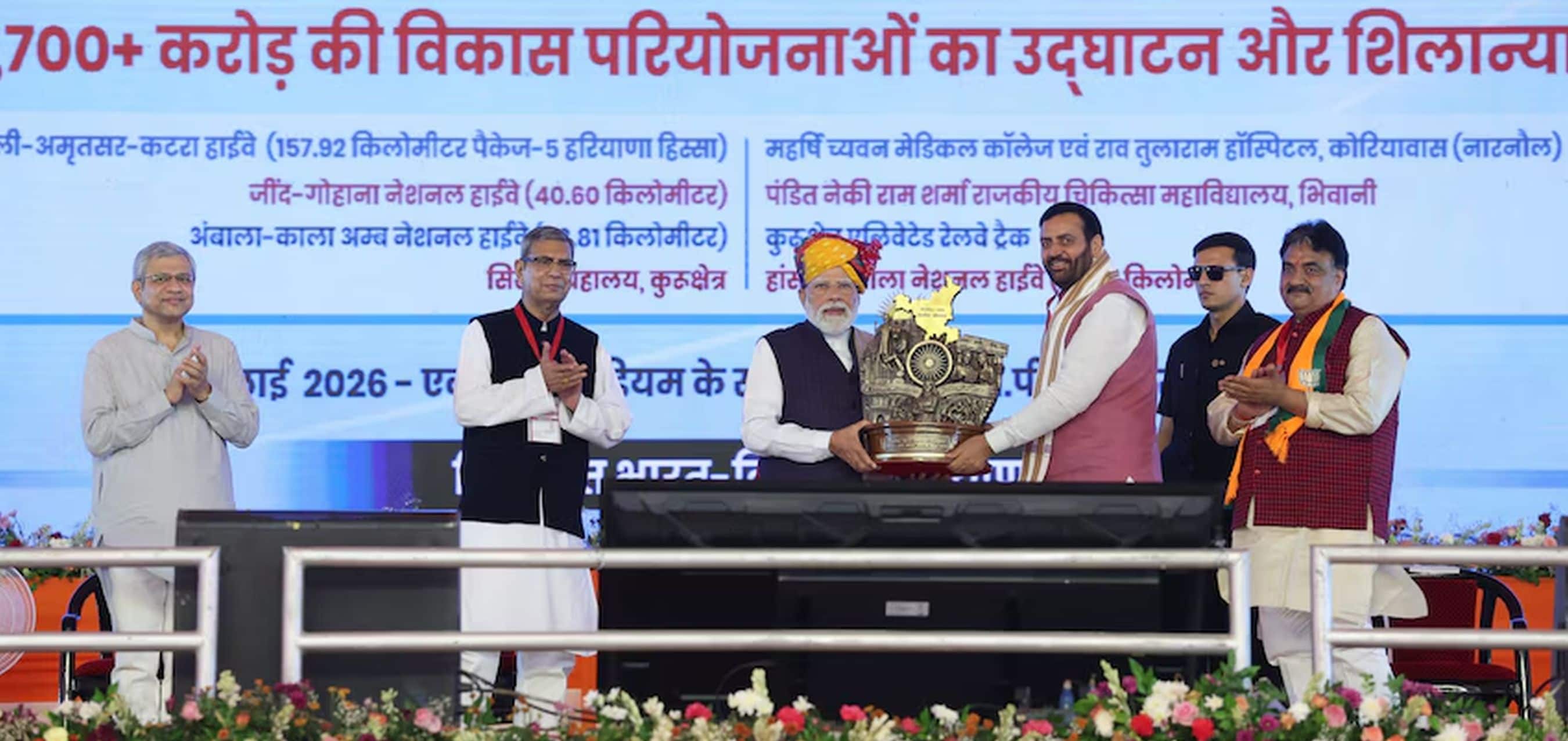 PM Modi lays foundation stone and dedicates to the nation various development projects worth around ₹14,700 crore in Jind, Haryana