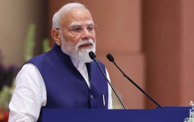 As he achieves record, PM vows faster reforms
