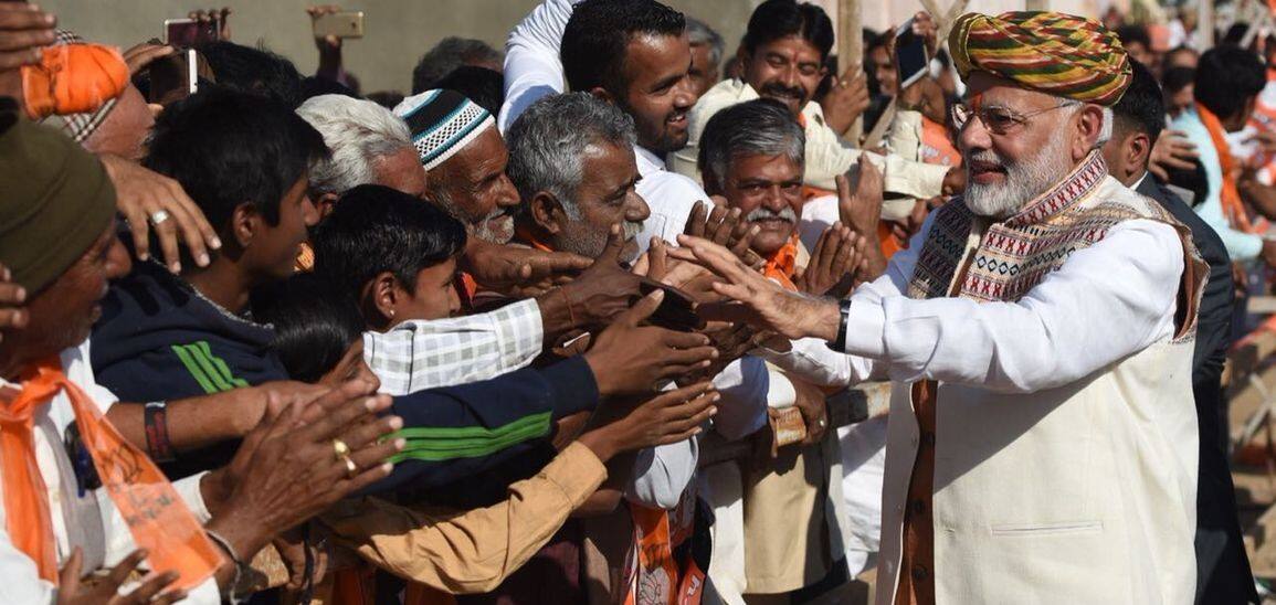 In Pictures: PM Modi receives a warm welcome in Gujarat!